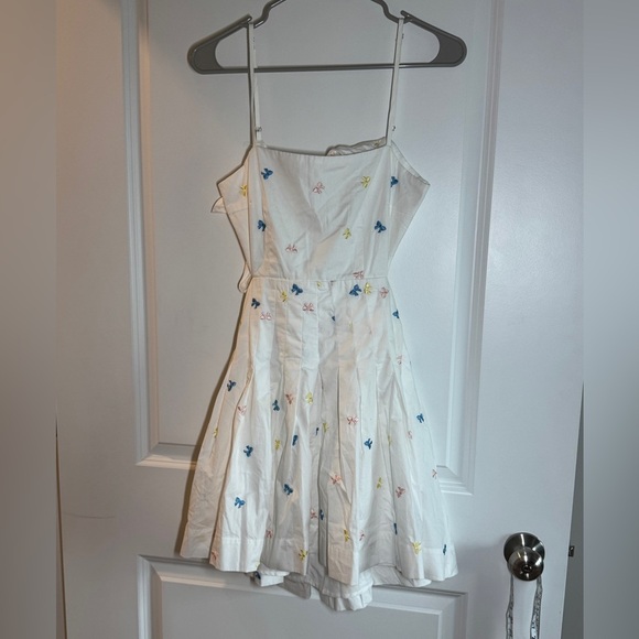 Chic White Backless Dress with Spaghetti Straps - Picture 13 of 13
